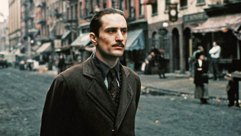 25. Moscow on the Hudson (1984), 24. Maria Full of Grace (2004), 23. Dirty Pretty Things (2002), 22. Big Night (1996), 21. Coming to America (1988), 20. A Better Life (2011), 19. The Immigrant (2014), 18. Gangs of New York (2002), 17. The Brutalist (2024), 16. Avalon (1990), 15. The Visitor (2007), 14. Stranger Than Paradise (1984), 13. In America (2002), 12. Minari (2021), 11. America, America (1963), 10. The Joy Luck Club (1993), 9. Brooklyn (2015), 8. La Promesse (1996), 7. The Secret of the Grain (2007), 6. The Namesake (2006), 5. The Godfather Part II (1974), 4. Dancer in the Dark (2000), 3. Black Girl (1966), 2. El Norte (1983), 1. Ali: Fear Eats the Soul (1974)
