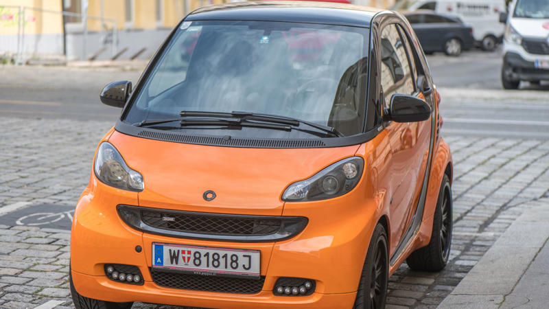 7. Smart Fortwo 1. Hummer H2, 2. BMW X6, 3. Tesla Cybertruck, 4. Dodge Challenger Hellcat, 5. Toyota Prius, 6. Jeep Wrangler 4xe, 7. Smart Fortwo, 8. Cadillac Escalade, 9. Ford Mustang EcoBoost, 10. Nissan Juke, 11. Dodge Ram TRX, 12. Tesla Model X, 13. Toyota C-HR, 14. GMC Hummer EV, 15. Lincoln MKT, 16. Mercedes-Benz G-Class, 17. BMW 7 Series (2023 redesign), 18. Pontiac Aztek, 19. Chevrolet SSR, 20. Lamborghini Urus