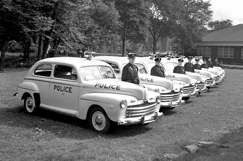Ford Police Cars for Dearborn, Michigan (1946) Who doesn’t like a police car?, Rapid Model F 700B Police Patrol Wagon (1910), Ford Model T Police Truck (1919), Lincoln Phaeton Police Flyers (1924), GMC Cowl Chassis (1929), Buick Four Door Sedan (1935), Chevrolet Master Deluxe Police Vehicle (1938), Plymouth P8 Coupe New York Police Car (1939), Ford Police Cars for Dearborn, Michigan (1946), Ford Police Car Brochure (1952), Chevrolet 210 Series Police Car (1956), Ford Fairlane Interceptors (1956), Dodge Coronet Police Car (1957), Chrysler Enforcer Police Car (1961), Dodge Dart Police Sedan (1962), Ford Police Interceptor (1963), Chevrolet Biscayne 2-door Police (1966), Dodge Polara Pursuit (1966), Pontiac Catalina Four Door Sedan Police Car (1969), Plymouth Satellite Police Car (1972), Chevrolet Nova Police Vehicle (1975), Ford Fairmont Police Car (1978), Plymouth Volare Police Car (1978), Ford Mustang Special Service Package (1982), Ford Crown Victoria Police Package (1992), Ford Crown Victoria Police Interceptor (2006), Chevrolet Impala Police Vehicle (2008), Chevrolet Tahoe Police Package (2010), Ford Police Interceptors (2010), Chevrolet Caprice PPV Police Sedan (2012), Dodge Durango and Charger Police (2019), What’s next?