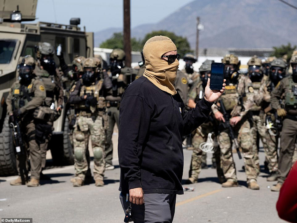 ICE protester opens fire on agents in clash at California farm