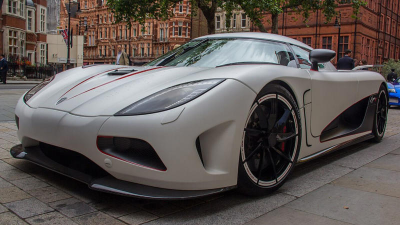 1. Ferrari, 2. Porsche, 3. Bentley, 4. Lamborghini, 5. Rolls-Royce, 6. Aston Martin, 7. McLaren, 8. Maserati, 9. Mercedes-Benz, 10. Bugatti Chiron, 11. Land Rover, 12. Lincoln, 14. Audi, 15. Tesla, 16. Koenigsegg, 17. Pagani, 18. Lexus, 19. Genesis, 20. Alfa Romeo