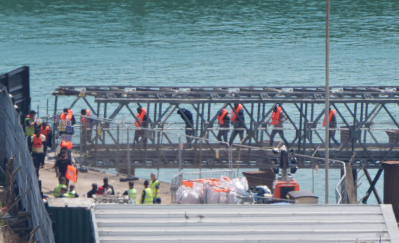 Key Points, Crackdown on illegal working promised alongside migrant return deal with France, In numbers: How many migrants cross Channel and who is turned away?, Editorial: Deal is a promising start, Arrival numbers rise two years running, Watch: Starmer takes veiled swipe at Farage, Deal will be no deterrent, say Tories, How migrants may win right to stay in UK, Analysis: Macron and Starmer still won’t stop the boats, Macron blames Brexit for rise in crossings, Pictured: Migrants arrive just as deal sealed, Prime minister vows to go further if scheme works, Red Cross calls on government to 'see the people behind the numbers', Starmer's one-in, one-out deal is an 'impractical unrealistic distraction', Denyer says, IRC condemns Starmer's migration deal as 'another step in wrong direction', Refugee Council chief urges 'comprehensive approach' to small boats crisis, Watch: Starmer reaffirms European commitment to Ukraine after Macron meeting, Starmer describes one in, one out scheme as 'breakthrough moment', Watch: Starmer takes swipe at Farage in migrant deal announcement with Macron, Starmer takes swipe at Nigel Farage over Channel stunt, Tackling irregular migration 'requires serious, pragmatic response', Starmer says, Farage calls Starmer's migration deal a 'humiliation for Brexit Britain', Brexit made it harder to combat illegal migration across Channel, Macron says, Returning migrants will 'break the model' of small boat crossings, Starmer says
