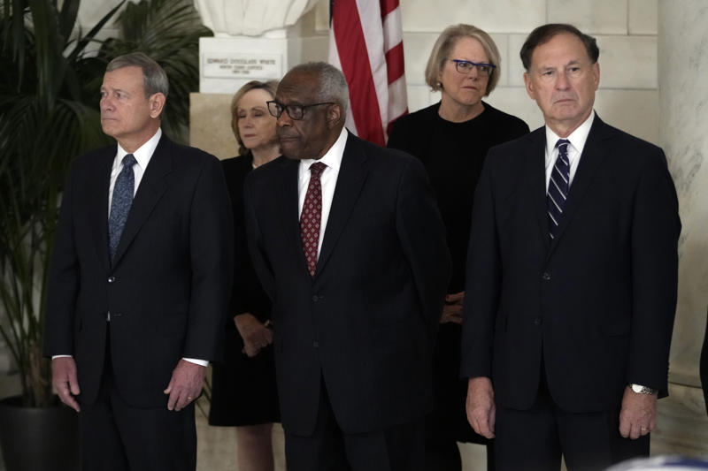 Supreme Court justices at Sandra Day O’Connor ceremony Graduate wearing MAGA hat at commencement, Trump merchandise at Iowa State Fairgrounds, MAGA Nation event with Trump supporters, Justice Clarence Thomas at inauguration ceremony, Supreme Court justices at Sandra Day O’Connor ceremony, Supreme Court Justices at Trump’s inauguration, The Supreme Court Justices lineup