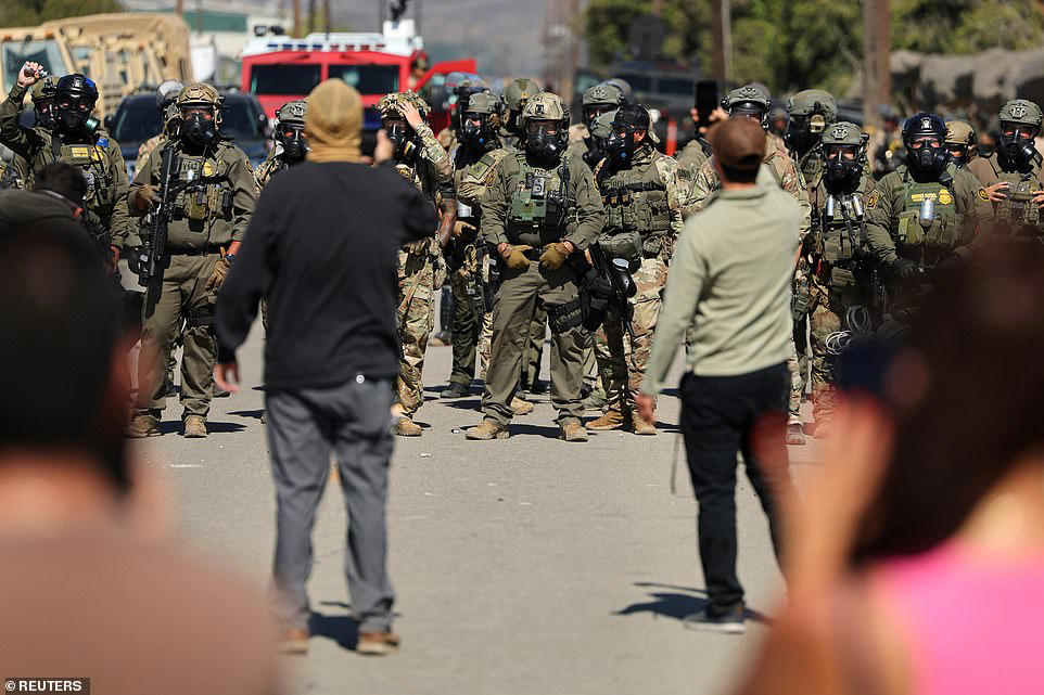 ICE protester opens fire on agents in clash at California farm