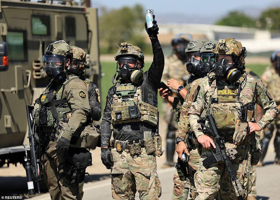 ICE protester opens fire on agents in clash at California farm