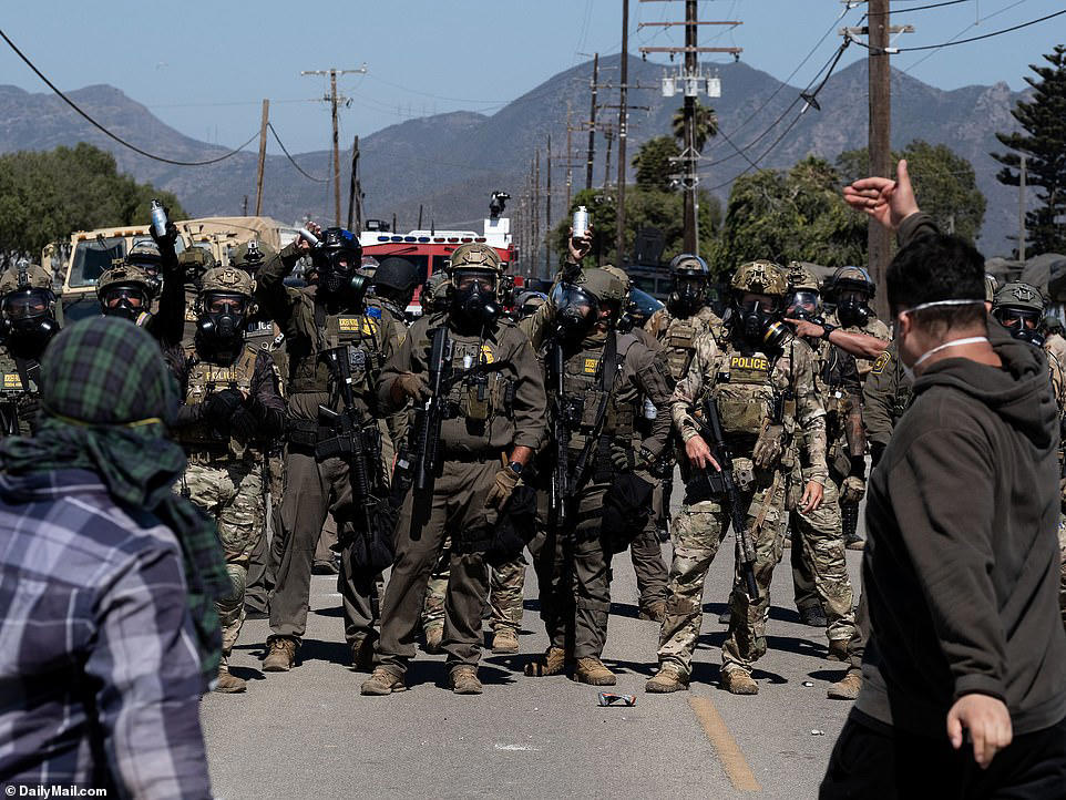 ICE protester opens fire on agents in clash at California farm