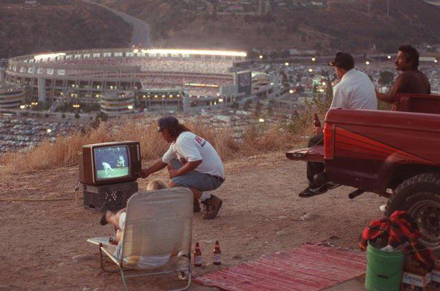 3. Creatively Catching the All-Star Game in San Diego (1992) 1. Pregaming Before ‘The Who’ Concert in Pittsburgh (Early 1980s), 2. Tailgating in a Full Suit at a Packers Game (Late 1970s), 3. Creatively Catching the All-Star Game in San Diego (1992), 4. Getting Hyped for Wrestlemania (1987), 5. New York Cosmos Fans Tailgating at Giants Stadium (1970s), 6. Tailgating at a ‘Genesis’ Concert, 7. Ringing in the Raiders’ Season Opener (1984), 8. Grilling at Milwaukee’s County Stadium (1977), 9. Throwing ‘Em Back at the Philadelphia Eagles Game (1983), 10. Tailgating at Shea Stadium After the Mets Won the World Series (1986), 11. Tailgating After a Dirt Bike Race Out in the Boondocks (1970s), 12. Tailgate Keg (1950s), 13. Going All Out for the Browns vs. Oilers Game (1988), 14. The Country Squire Was the Ultimate Picnic Ride (1960), 15. The Classiest Tailgate (1954), 16. There’s a Full Bar in the Trunk … (1980)