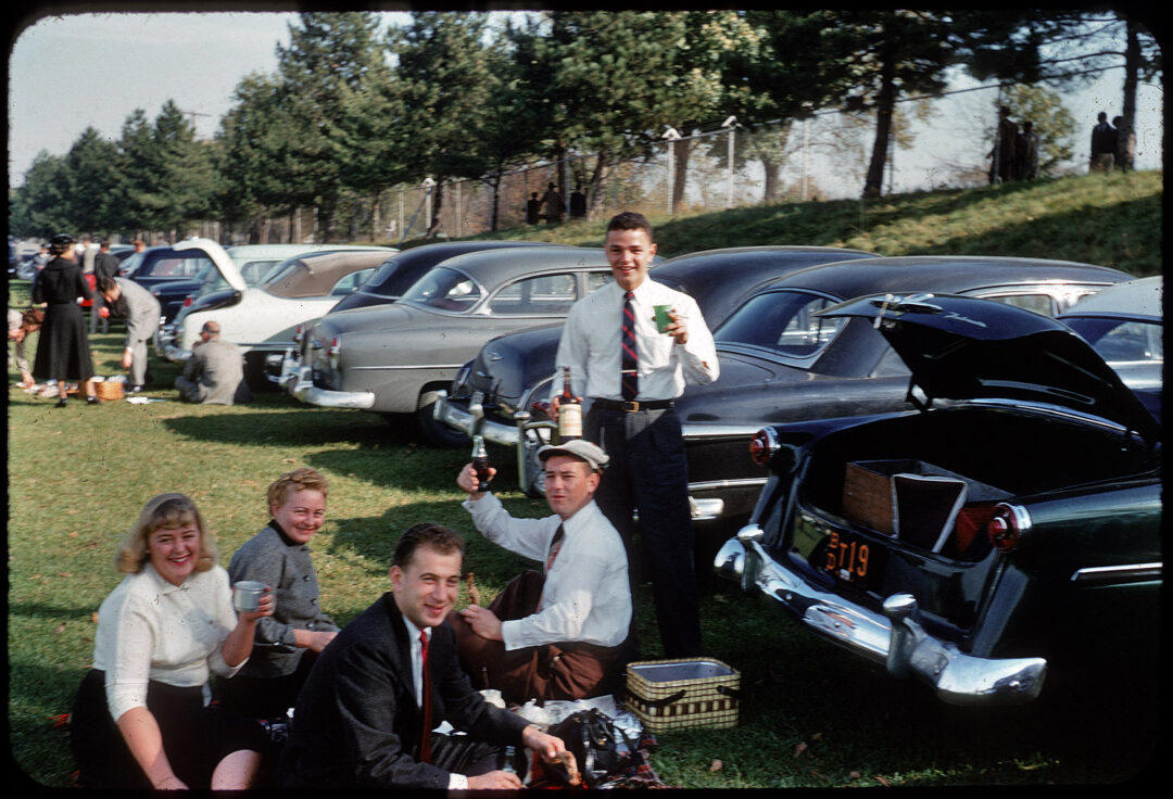 15. The Classiest Tailgate (1954) 1. Pregaming Before ‘The Who’ Concert in Pittsburgh (Early 1980s), 2. Tailgating in a Full Suit at a Packers Game (Late 1970s), 3. Creatively Catching the All-Star Game in San Diego (1992), 4. Getting Hyped for Wrestlemania (1987), 5. New York Cosmos Fans Tailgating at Giants Stadium (1970s), 6. Tailgating at a ‘Genesis’ Concert, 7. Ringing in the Raiders’ Season Opener (1984), 8. Grilling at Milwaukee’s County Stadium (1977), 9. Throwing ‘Em Back at the Philadelphia Eagles Game (1983), 10. Tailgating at Shea Stadium After the Mets Won the World Series (1986), 11. Tailgating After a Dirt Bike Race Out in the Boondocks (1970s), 12. Tailgate Keg (1950s), 13. Going All Out for the Browns vs. Oilers Game (1988), 14. The Country Squire Was the Ultimate Picnic Ride (1960), 15. The Classiest Tailgate (1954), 16. There’s a Full Bar in the Trunk … (1980)