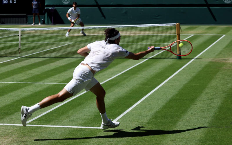 04:44 PM BST, Alcaraz reacts, 04:39 PM BST, Irresistible Alcaraz, 04:33 PM BST, Watch: How Alcaraz reached the men’s final, 04:28 PM BST, Alcaraz 6-4, 5-7, 6-3, 7-6 (8-6) Fritz - TIE-BREAK, 04:26 PM BST, Alcaraz 6-4, 5-7, 6-3, 6-6 (6-6) Fritz - TIE-BREAK, 04:22 PM BST, Alcaraz 6-4, 5-7, 6-3, 6-6 (4-2) Fritz - TIE-BREAK, 04:18 PM BST, Alcaraz 6-4, 5-7, 6-3, 6-6 Fritz*, 04:15 PM BST, Alcaraz* 6-4, 5-7, 6-3, 6-5 Fritz, 04:10 PM BST, Alcaraz 6-4, 5-7, 6-3, 5-5 Fritz*, 04:08 PM BST, Alcaraz* 6-4, 5-7, 6-3, 5-4 Fritz, 04:05 PM BST, Alcaraz 6-4, 5-7, 6-3, 4-4 Fritz*, 04:02 PM BST, Alcaraz* 6-4, 5-7, 6-3, 4-3 Fritz, 03:59 PM BST, Alcaraz 6-4, 5-7, 6-3, 3-3 Fritz*, 03:56 PM BST, Alcaraz* 6-4, 5-7, 6-3, 3-2 Fritz, 03:53 PM BST, Alcaraz 6-4, 5-7, 6-3, 2-2 Fritz*, 03:48 PM BST, Alcaraz* 6-4, 5-7, 6-3, 2-1 Fritz, 03:46 PM BST, Alcaraz 6-4, 5-7, 6-3, 1-1 Fritz*, 03:42 PM BST, Fourth set: Alcaraz* 6-4, 5-7, 6-3, 1-0 Fritz, 03:37 PM BST, Alcaraz 6-4, 5-7, 6-3 Fritz*, 03:33 PM BST, Alcaraz* 6-4, 5-7, 5-3 Fritz, 03:28 PM BST, Alcaraz 6-4, 5-7, 4-3 Fritz*, 03:26 PM BST, Alcaraz* 6-4, 5-7, 4-2 Fritz, 03:24 PM BST, Alcaraz 6-4, 5-7, 3-2 Fritz*, 03:21 PM BST, Alcaraz* 6-4, 5-7, 3-1 Fritz, 03:18 PM BST, Alcaraz 6-4, 5-7, 2-1 Fritz*, 03:15 PM BST, Alcaraz* 6-4, 5-7, 1-1 Fritz, 03:14 PM BST, ‘A few more empty seats on Centre Court’, 03:13 PM BST, Third set: Alcaraz 6-4, 5-7, 0-1 Fritz*, 03:05 PM BST, ‘Those on Centre Court could now be in for a thriller’, 03:03 PM BST, Alcaraz* 6-4, 5-7 Fritz, 03:00 PM BST, Alcaraz 6-4, 5-6 Fritz*, 02:56 PM BST, Alcaraz* 6-4, 5-5 Fritz, 02:52 PM BST, Alcaraz 6-4, 4-5 Fritz*, 02:48 PM BST, Alcaraz* 6-4, 4-4 Fritz, 02:38 PM BST, Alcaraz 6-4, 3-4 Fritz*, 02:36 PM BST, Alcaraz* 6-4, 3-3 Fritz, 02:34 PM BST, Alcaraz 6-4, 2-3 Fritz*, 02:32 PM BST, ‘Fritz will have to hope he gets another chance’, 02:31 PM BST, Alcaraz* 6-4, 2-2 Fritz, 02:27 PM BST, Alcaraz 6-4, 1-2 Fritz*, 02:22 PM BST, Alcaraz* 6-4, 1-1 Fritz, 02:20 PM BST, ‘Fritz did not do too much wrong’, 02:19 PM BST, Second set: Alcaraz 6-4, 0-1 Fritz*, 02:16 PM BST, Alcaraz* 6-4 Fritz, 02:11 PM BST, Alcaraz 5-4 Fritz*, 02:08 PM BST, Alcaraz* 5-3 Fritz, 02:03 PM BST, Alcaraz 4-3 Fritz*, 02:00 PM BST, Alcaraz* 4-2 Fritz, 01:56 PM BST, Alcaraz 3-2 Fritz*, 01:51 PM BST, Alcaraz* 3-1 Fritz, 01:48 PM BST, 01:47 PM BST, Alcaraz 2-1 Fritz*, 01:45 PM BST, Alcaraz* 2-0 Fritz, 01:43 PM BST, First set: Carlos Alcaraz 1-0 Taylor Fritz* (*denotes server), 01:38 PM BST, Here we go!, 01:27 PM BST, The tennis girlfriend and fashion queen who has taken over Wimbledon, 01:21 PM BST, Big names in the Royal Box, 01:13 PM BST, Data that shows Carlos Alcaraz is in league of his own, 01:02 PM BST, Sign up to our Telegraph Sport newsletter, 12:52 PM BST, Men’s semi-final day