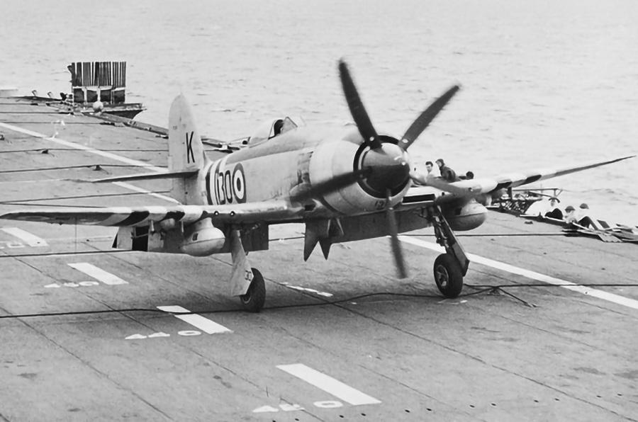 11: Hawker Sea Fury, 10: Douglas A-1 Skyraider, 9: Douglas A-4 Skyhawk, 8: Vought F-8 Crusader, 7: McDonnell Douglas F/A-18 Hornet, 6: McDonnell Douglas F-4 Phantom II, 5: BAe Sea Harrier, 4: Blackburn Buccaneer, 3: Grumman A-6 Intruder, 2: A-3 Skywarrior, 1: Grumman F-14 Tomcat