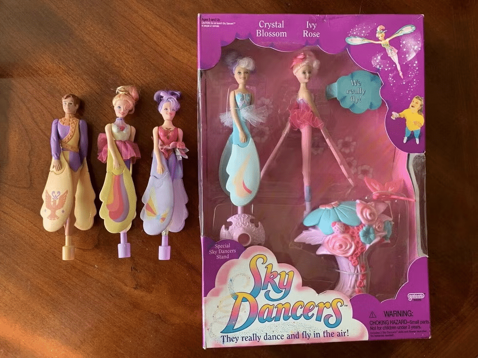 #33: Sky Dancers #1: Cabbage Patch Snacktime Kids, #3: Slip ‘N Slide, #4: Clackers, #6: Moon Shoes, #7: Garbage Pail Kids, #9: Skip-It, #10: My Little Pony – Long Haired, #12: Aquanet Hairspray, #13: Bubble Lights, #15: Jelly Shoes, #16: Lite-Brite, #18: Lawn Pool Slides, #19: Pogo Balls, #21: Big Wheels, #22: Slap Bracelets, #24: Hang 10 Mini Hammocks, #25: Jarts, #27: Battlestar Galactica Colonial Viper, #28: Water Wiggle, #30: Rambo Toy Machine Gun, #31: Smoking Monkey Toy, #33: Sky Dancers