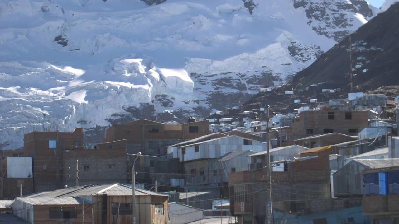 2. La Rinconada, Peru Perched at nearly 17,000 feet above sea level, La Rinconada is the highest permanent settlement on Earth. The thin atmosphere makes every breath laborious, while year-round sub-zero temperatures render daily tasks arduous. Its unregulated gold mines attract thousands despite the absence of basic infrastructure. Mercury contamination, lack of sanitation, and oxygen deprivation are part of daily life in this mountain outpost often described as purgatory on Earth. (Image: Wikipedia) 2. La Rinconada, Peru Perched at nearly 17,000 feet above sea level, La Rinconada is the highest permanent settlement on Earth. The thin atmosphere makes every breath laborious, while year-round sub-zero temperatures render daily tasks arduous. Its unregulated gold mines attract thousands despite the absence of basic infrastructure. Mercury contamination, lack of sanitation, and oxygen deprivation are part of daily life in this mountain outpost often described as purgatory on Earth. (Image: Wikipedia), 3. Yakutsk, Russia Situated deep in Siberia, Yakutsk is the coldest major city in the world. Winter temperatures routinely plunge below -40°C, freezing skin in mere moments. Homes are built on stilts to avoid melting the permafrost, and vehicles must be kept running to prevent their engines from freezing solid. Yet, over 340,000 people call it home, adapting with ingenuity and endurance to an environment that offers neither forgiveness nor reprieve. (Image: Canva), 4. Norilsk, Russia Locked behind the Arctic Circle, Norilsk is both remote and toxic. Established as a mining town, it suffers from some of the world’s worst industrial pollution. Residents breathe in sulfur-laced air while black snow falls during winter. The city endures a 45-day polar night, and the landscape within a 30-mile radius is barren due to acid rain. It remains a closed city, inaccessible without official permission. (Image: Canva), 5. Dallol, Ethiopia Dallol, located in the Danakil Depression, holds the record for the highest average annual temperature ever recorded. With its sulphuric pools, neon mineral crusts, and geysers of toxic steam, it resembles a science fiction set more than a human habitat. Though now uninhabited, nomads and salt miners still pass through, navigating an area where rainfall is virtually nonexistent and the air can scald. (Image: Canva), 6. Ittoqqortoormiit, Greenland Remote and ice-bound for much of the year, this settlement is a study in isolation. Home to roughly 350 people, it can only be reached by helicopter or boat during brief windows of accessibility. Winter darkness lasts for months, temperatures plummet, and polar bears pose a very real threat. Emergency evacuations are perilous, and the nearest neighbouring town is 300 miles away. (Image: Canva), 8. Chernobyl, Ukraine Within the Chernobyl Exclusion Zone, a small number of elderly inhabitants defy radiation and time. After the 1986 meltdown, most fled. Some, however, returned to reclaim their homes, despite radiation levels still far exceeding safety norms. These residents live without running water or medical care, growing food in contaminated soil. Their lives carry the quiet defiance of those who have outlived disaster. (Image: Canva), 9. Dharavi, Mumbai, India Spanning less than a square mile, Dharavi houses close to a million people, making it one of the most densely packed urban areas on Earth. Narrow alleys, unregulated electricity, and poor sanitation foster conditions ripe for fire, flood, and disease. Despite its challenges, Dharavi is also an economic engine—home to thousands of micro-industries producing textiles, pottery, and recycled goods worth over a billion dollars annually. (Image: Canva), 10. Villa Las Estrellas, Antarctica Located on King George Island, this Chilean settlement resembles a scientific outpost more than a town. Long-term residents must undergo appendectomies before arriving, as medical facilities are rudimentary and evacuations impossible in winter. Here, families endure endless nights, hurricane-force winds, and frigid temperatures, living in prefabricated homes amid one of Earth’s most hostile environments. (Image: Wikipedia), 11. Barrow (Utqiaġvik), Alaska, USA The northernmost city in the United States lives in the shadow of disappearing coastlines and encroaching darkness. Barrow experiences more than two months without sunlight each winter. Supply chains are fragile, with most goods arriving by air. Climate change has turned the surrounding permafrost into sinking land, while sea ice retreats leave it more exposed to erosion. Yet life here persists—rugged, quiet, and enduring. (Image: Canva)