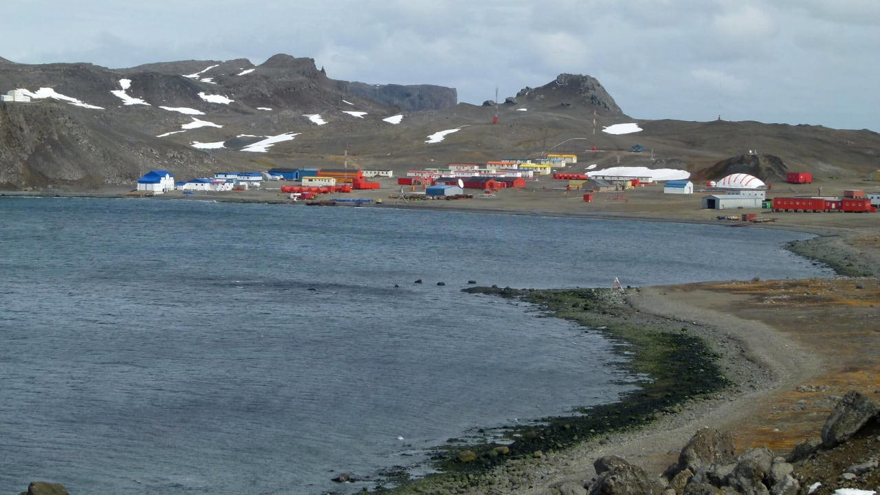 10. Villa Las Estrellas, Antarctica Located on King George Island, this Chilean settlement resembles a scientific outpost more than a town. Long-term residents must undergo appendectomies before arriving, as medical facilities are rudimentary and evacuations impossible in winter. Here, families endure endless nights, hurricane-force winds, and frigid temperatures, living in prefabricated homes amid one of Earth’s most hostile environments. (Image: Wikipedia) 2. La Rinconada, Peru Perched at nearly 17,000 feet above sea level, La Rinconada is the highest permanent settlement on Earth. The thin atmosphere makes every breath laborious, while year-round sub-zero temperatures render daily tasks arduous. Its unregulated gold mines attract thousands despite the absence of basic infrastructure. Mercury contamination, lack of sanitation, and oxygen deprivation are part of daily life in this mountain outpost often described as purgatory on Earth. (Image: Wikipedia), 3. Yakutsk, Russia Situated deep in Siberia, Yakutsk is the coldest major city in the world. Winter temperatures routinely plunge below -40°C, freezing skin in mere moments. Homes are built on stilts to avoid melting the permafrost, and vehicles must be kept running to prevent their engines from freezing solid. Yet, over 340,000 people call it home, adapting with ingenuity and endurance to an environment that offers neither forgiveness nor reprieve. (Image: Canva), 4. Norilsk, Russia Locked behind the Arctic Circle, Norilsk is both remote and toxic. Established as a mining town, it suffers from some of the world’s worst industrial pollution. Residents breathe in sulfur-laced air while black snow falls during winter. The city endures a 45-day polar night, and the landscape within a 30-mile radius is barren due to acid rain. It remains a closed city, inaccessible without official permission. (Image: Canva), 5. Dallol, Ethiopia Dallol, located in the Danakil Depression, holds the record for the highest average annual temperature ever recorded. With its sulphuric pools, neon mineral crusts, and geysers of toxic steam, it resembles a science fiction set more than a human habitat. Though now uninhabited, nomads and salt miners still pass through, navigating an area where rainfall is virtually nonexistent and the air can scald. (Image: Canva), 6. Ittoqqortoormiit, Greenland Remote and ice-bound for much of the year, this settlement is a study in isolation. Home to roughly 350 people, it can only be reached by helicopter or boat during brief windows of accessibility. Winter darkness lasts for months, temperatures plummet, and polar bears pose a very real threat. Emergency evacuations are perilous, and the nearest neighbouring town is 300 miles away. (Image: Canva), 8. Chernobyl, Ukraine Within the Chernobyl Exclusion Zone, a small number of elderly inhabitants defy radiation and time. After the 1986 meltdown, most fled. Some, however, returned to reclaim their homes, despite radiation levels still far exceeding safety norms. These residents live without running water or medical care, growing food in contaminated soil. Their lives carry the quiet defiance of those who have outlived disaster. (Image: Canva), 9. Dharavi, Mumbai, India Spanning less than a square mile, Dharavi houses close to a million people, making it one of the most densely packed urban areas on Earth. Narrow alleys, unregulated electricity, and poor sanitation foster conditions ripe for fire, flood, and disease. Despite its challenges, Dharavi is also an economic engine—home to thousands of micro-industries producing textiles, pottery, and recycled goods worth over a billion dollars annually. (Image: Canva), 10. Villa Las Estrellas, Antarctica Located on King George Island, this Chilean settlement resembles a scientific outpost more than a town. Long-term residents must undergo appendectomies before arriving, as medical facilities are rudimentary and evacuations impossible in winter. Here, families endure endless nights, hurricane-force winds, and frigid temperatures, living in prefabricated homes amid one of Earth’s most hostile environments. (Image: Wikipedia), 11. Barrow (Utqiaġvik), Alaska, USA The northernmost city in the United States lives in the shadow of disappearing coastlines and encroaching darkness. Barrow experiences more than two months without sunlight each winter. Supply chains are fragile, with most goods arriving by air. Climate change has turned the surrounding permafrost into sinking land, while sea ice retreats leave it more exposed to erosion. Yet life here persists—rugged, quiet, and enduring. (Image: Canva)