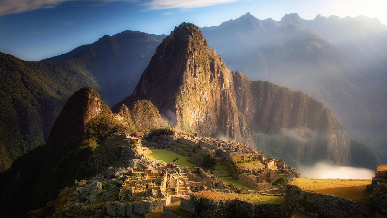 3. MACHU PICCHU, PERU: One of the Seven Wonders of the World, Machu Picchu sits 7,970 feet above sea level in the Andes Mountains. The ancient Incan city is shrouded in mist and mystery, offering panoramic views of lush green peaks and dramatic valleys that leave travelers in awe. 1. SANTORINI, GREECE: Famous for its whitewashed buildings and cerulean-domed churches, Santorini offers one of the most iconic sunsets in the world. Perched on volcanic cliffs overlooking the Aegean Sea, Oia village becomes a golden dream as the sun dips below the horizon. It’s no wonder this island is a top romantic getaway., 2. BANFF NATIONAL PARK, CANADA: Nestled in the Canadian Rockies, Banff National Park is a paradise for nature lovers. The turquoise waters of Lake Louise and Moraine Lake, surrounded by snow-capped peaks and alpine forests, offer picture-perfect scenery in every season., 3. MACHU PICCHU, PERU: One of the Seven Wonders of the World, Machu Picchu sits 7,970 feet above sea level in the Andes Mountains. The ancient Incan city is shrouded in mist and mystery, offering panoramic views of lush green peaks and dramatic valleys that leave travelers in awe., 4. THE GRAND CANYON, USA: A UNESCO World Heritage Site, the Grand Canyon is a geological marvel carved by the Colorado River over millions of years. Its layered red rock formations and expansive vistas are best viewed from the South Rim or via a scenic helicopter tour., 5. FIORDLAND NATIONAL PARK, NEW ZEALAND: Home to the stunning Milford Sound, Fiordland is a pristine wilderness of dramatic fjords, waterfalls, and towering cliffs. Whether you explore it by boat, kayak, or hiking trail, every angle reveals a new jaw-dropping view., 6. TROLLTUNGA, NORWAY: This epic cliff jutting out over a stunning lake in Norway offers one of the most adventurous viewpoints in the world. After a challenging hike, you’re rewarded with panoramic views of snow-covered mountains and deep blue fjords that stretch for miles., 7. VICTORIA FALLS, ZAMBI: Known as “The Smoke That Thunders,” Victoria Falls is one of the largest and most spectacular waterfalls on Earth. During the rainy season, the sheer volume of water creates a mist that can be seen from miles away, adding to the wonder of this natural marvel., 8. PETRA, JORDAN: Carved into rose-colored rock, Petra is an archaeological wonder and a photographer’s dream. The sight of the Treasury emerging from narrow sandstone canyons (Siq) is nothing short of breathtaking, especially at sunrise or by candlelight during Petra by Night., 9. MOUNT EVEREST BASE CAMP, NEPAL: For trekkers and climbers, the journey to Everest Base Camp is as rewarding as the destination itself. Surrounded by the towering Himalayas and colorful prayer flags fluttering in the wind, the views are both humbling and spiritually uplifting., 10. ANTELOPE CANYON, USA: Located in Arizona, Antelope Canyon is a slot canyon known for its smooth, wave-like sandstone walls. When sunlight beams down into the narrow crevices, it creates an ethereal play of light and shadow that feels like stepping into another world.