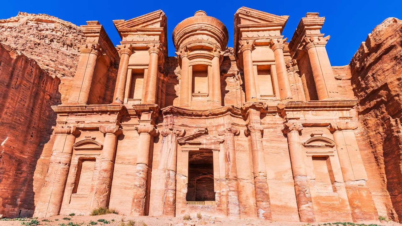 8. PETRA, JORDAN: Carved into rose-colored rock, Petra is an archaeological wonder and a photographer’s dream. The sight of the Treasury emerging from narrow sandstone canyons (Siq) is nothing short of breathtaking, especially at sunrise or by candlelight during Petra by Night. 1. SANTORINI, GREECE: Famous for its whitewashed buildings and cerulean-domed churches, Santorini offers one of the most iconic sunsets in the world. Perched on volcanic cliffs overlooking the Aegean Sea, Oia village becomes a golden dream as the sun dips below the horizon. It’s no wonder this island is a top romantic getaway., 2. BANFF NATIONAL PARK, CANADA: Nestled in the Canadian Rockies, Banff National Park is a paradise for nature lovers. The turquoise waters of Lake Louise and Moraine Lake, surrounded by snow-capped peaks and alpine forests, offer picture-perfect scenery in every season., 3. MACHU PICCHU, PERU: One of the Seven Wonders of the World, Machu Picchu sits 7,970 feet above sea level in the Andes Mountains. The ancient Incan city is shrouded in mist and mystery, offering panoramic views of lush green peaks and dramatic valleys that leave travelers in awe., 4. THE GRAND CANYON, USA: A UNESCO World Heritage Site, the Grand Canyon is a geological marvel carved by the Colorado River over millions of years. Its layered red rock formations and expansive vistas are best viewed from the South Rim or via a scenic helicopter tour., 5. FIORDLAND NATIONAL PARK, NEW ZEALAND: Home to the stunning Milford Sound, Fiordland is a pristine wilderness of dramatic fjords, waterfalls, and towering cliffs. Whether you explore it by boat, kayak, or hiking trail, every angle reveals a new jaw-dropping view., 6. TROLLTUNGA, NORWAY: This epic cliff jutting out over a stunning lake in Norway offers one of the most adventurous viewpoints in the world. After a challenging hike, you’re rewarded with panoramic views of snow-covered mountains and deep blue fjords that stretch for miles., 7. VICTORIA FALLS, ZAMBI: Known as “The Smoke That Thunders,” Victoria Falls is one of the largest and most spectacular waterfalls on Earth. During the rainy season, the sheer volume of water creates a mist that can be seen from miles away, adding to the wonder of this natural marvel., 8. PETRA, JORDAN: Carved into rose-colored rock, Petra is an archaeological wonder and a photographer’s dream. The sight of the Treasury emerging from narrow sandstone canyons (Siq) is nothing short of breathtaking, especially at sunrise or by candlelight during Petra by Night., 9. MOUNT EVEREST BASE CAMP, NEPAL: For trekkers and climbers, the journey to Everest Base Camp is as rewarding as the destination itself. Surrounded by the towering Himalayas and colorful prayer flags fluttering in the wind, the views are both humbling and spiritually uplifting., 10. ANTELOPE CANYON, USA: Located in Arizona, Antelope Canyon is a slot canyon known for its smooth, wave-like sandstone walls. When sunlight beams down into the narrow crevices, it creates an ethereal play of light and shadow that feels like stepping into another world.