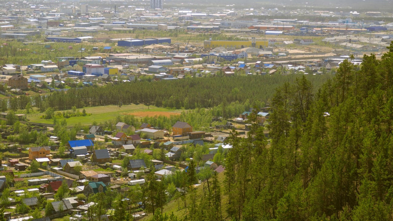 3. Yakutsk, Russia Situated deep in Siberia, Yakutsk is the coldest major city in the world. Winter temperatures routinely plunge below -40°C, freezing skin in mere moments. Homes are built on stilts to avoid melting the permafrost, and vehicles must be kept running to prevent their engines from freezing solid. Yet, over 340,000 people call it home, adapting with ingenuity and endurance to an environment that offers neither forgiveness nor reprieve. (Image: Canva) 2. La Rinconada, Peru Perched at nearly 17,000 feet above sea level, La Rinconada is the highest permanent settlement on Earth. The thin atmosphere makes every breath laborious, while year-round sub-zero temperatures render daily tasks arduous. Its unregulated gold mines attract thousands despite the absence of basic infrastructure. Mercury contamination, lack of sanitation, and oxygen deprivation are part of daily life in this mountain outpost often described as purgatory on Earth. (Image: Wikipedia), 3. Yakutsk, Russia Situated deep in Siberia, Yakutsk is the coldest major city in the world. Winter temperatures routinely plunge below -40°C, freezing skin in mere moments. Homes are built on stilts to avoid melting the permafrost, and vehicles must be kept running to prevent their engines from freezing solid. Yet, over 340,000 people call it home, adapting with ingenuity and endurance to an environment that offers neither forgiveness nor reprieve. (Image: Canva), 4. Norilsk, Russia Locked behind the Arctic Circle, Norilsk is both remote and toxic. Established as a mining town, it suffers from some of the world’s worst industrial pollution. Residents breathe in sulfur-laced air while black snow falls during winter. The city endures a 45-day polar night, and the landscape within a 30-mile radius is barren due to acid rain. It remains a closed city, inaccessible without official permission. (Image: Canva), 5. Dallol, Ethiopia Dallol, located in the Danakil Depression, holds the record for the highest average annual temperature ever recorded. With its sulphuric pools, neon mineral crusts, and geysers of toxic steam, it resembles a science fiction set more than a human habitat. Though now uninhabited, nomads and salt miners still pass through, navigating an area where rainfall is virtually nonexistent and the air can scald. (Image: Canva), 6. Ittoqqortoormiit, Greenland Remote and ice-bound for much of the year, this settlement is a study in isolation. Home to roughly 350 people, it can only be reached by helicopter or boat during brief windows of accessibility. Winter darkness lasts for months, temperatures plummet, and polar bears pose a very real threat. Emergency evacuations are perilous, and the nearest neighbouring town is 300 miles away. (Image: Canva), 8. Chernobyl, Ukraine Within the Chernobyl Exclusion Zone, a small number of elderly inhabitants defy radiation and time. After the 1986 meltdown, most fled. Some, however, returned to reclaim their homes, despite radiation levels still far exceeding safety norms. These residents live without running water or medical care, growing food in contaminated soil. Their lives carry the quiet defiance of those who have outlived disaster. (Image: Canva), 9. Dharavi, Mumbai, India Spanning less than a square mile, Dharavi houses close to a million people, making it one of the most densely packed urban areas on Earth. Narrow alleys, unregulated electricity, and poor sanitation foster conditions ripe for fire, flood, and disease. Despite its challenges, Dharavi is also an economic engine—home to thousands of micro-industries producing textiles, pottery, and recycled goods worth over a billion dollars annually. (Image: Canva), 10. Villa Las Estrellas, Antarctica Located on King George Island, this Chilean settlement resembles a scientific outpost more than a town. Long-term residents must undergo appendectomies before arriving, as medical facilities are rudimentary and evacuations impossible in winter. Here, families endure endless nights, hurricane-force winds, and frigid temperatures, living in prefabricated homes amid one of Earth’s most hostile environments. (Image: Wikipedia), 11. Barrow (Utqiaġvik), Alaska, USA The northernmost city in the United States lives in the shadow of disappearing coastlines and encroaching darkness. Barrow experiences more than two months without sunlight each winter. Supply chains are fragile, with most goods arriving by air. Climate change has turned the surrounding permafrost into sinking land, while sea ice retreats leave it more exposed to erosion. Yet life here persists—rugged, quiet, and enduring. (Image: Canva)