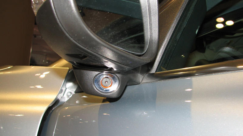 Blind Spot Monitoring Best And Worst Car Trends, Automatic Seatbelts, Touchscreen-Only Controls, Pop-Up Headlights, Faux Engine Sounds Through The Speakers, Built-In Navigation Systems That Aged Terribly, Rear-Mounted Spare Tires On Compact Cars, Plastic Wood Grain Interior Trim, Push-Button Transmissions, Gimmicky Gullwing Doors On Everyday Models, Built-In DVD Players In The Age Of Tablets, Retractable Hardtops, Overly Sensitive Lane Departure Warnings, Apple CarPlay And Android Auto Integration, Hybrid Powertrains, Heads-Up Displays, Heated And Ventilated Seats, Lane-Keeping Assist, Keyless Entry And Push-To-Start, Parking Sensors, Wireless Charging Pads, Automatic Rain-Sensing Wipers, Hands-Free Liftgates, Blind Spot Monitoring