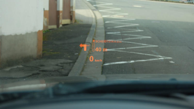 Heads-Up Displays Best And Worst Car Trends, Automatic Seatbelts, Touchscreen-Only Controls, Pop-Up Headlights, Faux Engine Sounds Through The Speakers, Built-In Navigation Systems That Aged Terribly, Rear-Mounted Spare Tires On Compact Cars, Plastic Wood Grain Interior Trim, Push-Button Transmissions, Gimmicky Gullwing Doors On Everyday Models, Built-In DVD Players In The Age Of Tablets, Retractable Hardtops, Overly Sensitive Lane Departure Warnings, Apple CarPlay And Android Auto Integration, Hybrid Powertrains, Heads-Up Displays, Heated And Ventilated Seats, Lane-Keeping Assist, Keyless Entry And Push-To-Start, Parking Sensors, Wireless Charging Pads, Automatic Rain-Sensing Wipers, Hands-Free Liftgates, Blind Spot Monitoring
