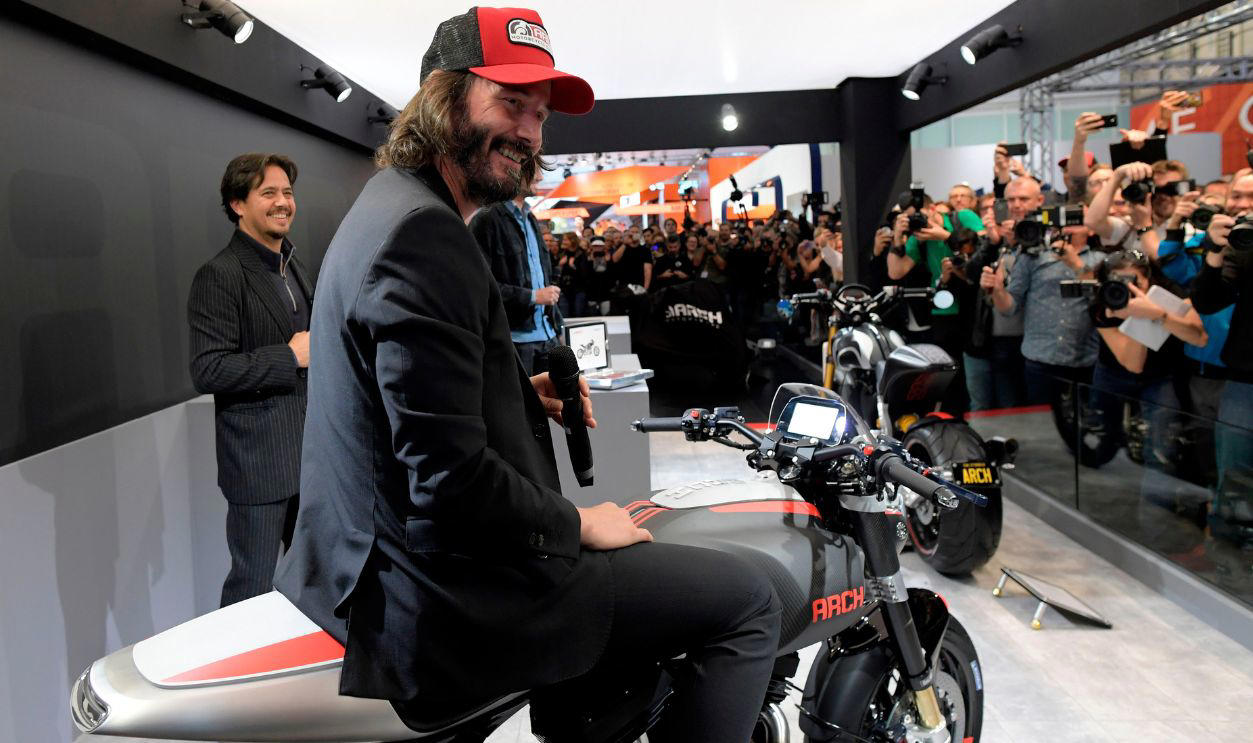 More Than Just An Actor A Beloved Icon With A Need For Speed, His First Bike, A Diverse Taste, Arch Motorcycle Company: His Passion Project, The Arch KRGT-1, Arch 1s: Café Racer Meets Muscle, Arch Method 143: Carbon Fiber Luxury, Custom Harley-Davidson Dyna Wide Glide, El Diablo West Coast Chopper, BMW R NineT, Kawasaki Ninja ZX-10R, Moto Guzzi V7 Racer, Norton Commando 850 MK II Roadster, Yamaha R1, Aprilia RSV4, Ferrari California T, Porsche 911 Carrera 4S, Volvo 122 Amazon, Mercedes-Benz GLE, Arch KRGT-1 Track Edition, Custom BMW S1000RR, Confident But Not Flashy, More Than Just An Actor, Celebrity Biker Club, Keanu Reeves’ Garage: Functional Zen, Safety First, Long Rides, Big Thoughts, No Lambo, No Problem, Giving Back Through Wheels, The Future Of Arch