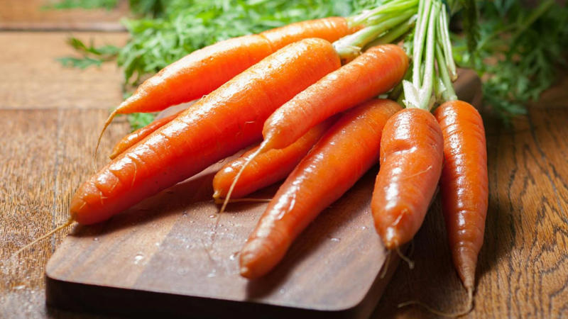 12. Carrots Help Prevent Acne 1. Sweet Potatoes Reduce Inflammation, 2. Sunflower Seeds Support Collagen Production, 3. Red Grapes Defend Against UV Damage, 4. Bell Peppers Brighten Complexion, 5. Green Tea Reduces Acne Flare-Ups, 6. Avocados Improve Skin Elasticity, 7. Walnuts Provide Essential Skin Nutrients, 8. Tomatoes Shield Skin From The Sun, 9. Fatty Fish Fight Skin Aging, 10. Broccoli Boosts Skin Immunity, 11. Oranges Enhance Skin Radiance, 12. Carrots Help Prevent Acne, 13. Turmeric Clears Skin Inflammation, 14. Kiwi Repairs Damaged Skin, 15. Blueberries Protect Against Premature Aging, 16. Dark Chocolate Hydrates Skin, 17. Mushrooms Improve Skin Tone, 18. Cucumber Soothes Irritated Skin, 19. Almonds Protect Against UV Damage, 20. Watermelon Helps With Hydration