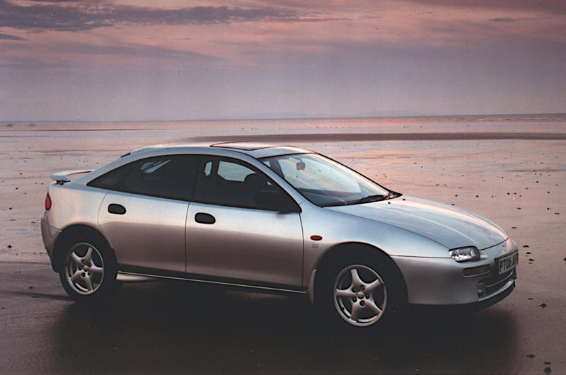 23. Mazda 323F (1993) 1. Mazda R360 (1960), 2. Mazda B-series (1961), 3. Mazda P360 Carol (1962), 4. Mazda Familia (1963), 5. Mazda B-series (1965), 6. Mazda Bongo (1966), 7. Mazda Luce (1966), 8. Mazda Cosmo Sport (1967), 9. Mazda Luce R130 (1969), 10. Mazda RX-2 (1970), 11. Mazda RX-3 (1971), 12. Mazda Chantez (1972), 13. Mazda RX-4 (1972), 14. Mazda RX-5 (1975), 15. Mazda RX-7 (1978), 16. Mazda 323 (1980), 17. Mazda MX-5 (1989), 18. Eunos Cosmo (1990), 19. Mazda 787B (1991), 20. Mazda MX-3 (1991), 21. Autozam AZ-1 (1992), 22. Mazda Xedos 6 (1992), 23. Mazda 323F (1993), 24. Mazda Bongo Friendee (1995), 25. Mazda Demio (1996), 26. Mazda MX-5 (1998)