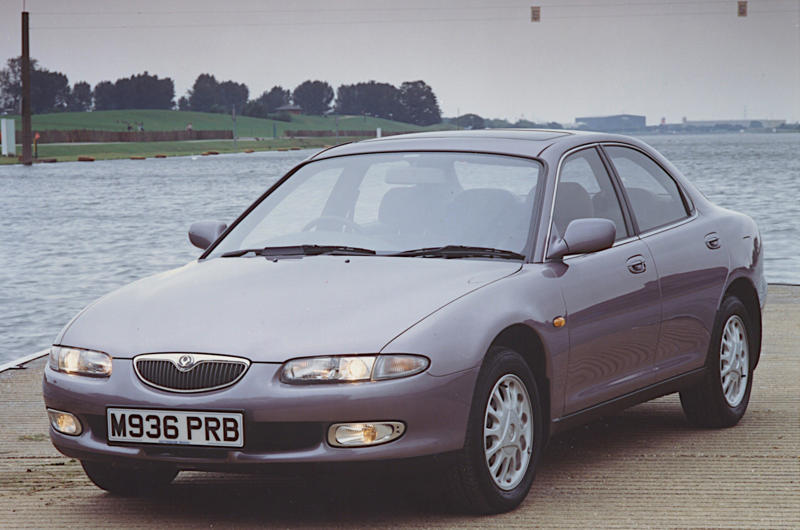 22. Mazda Xedos 6 (1992) 1. Mazda R360 (1960), 2. Mazda B-series (1961), 3. Mazda P360 Carol (1962), 4. Mazda Familia (1963), 5. Mazda B-series (1965), 6. Mazda Bongo (1966), 7. Mazda Luce (1966), 8. Mazda Cosmo Sport (1967), 9. Mazda Luce R130 (1969), 10. Mazda RX-2 (1970), 11. Mazda RX-3 (1971), 12. Mazda Chantez (1972), 13. Mazda RX-4 (1972), 14. Mazda RX-5 (1975), 15. Mazda RX-7 (1978), 16. Mazda 323 (1980), 17. Mazda MX-5 (1989), 18. Eunos Cosmo (1990), 19. Mazda 787B (1991), 20. Mazda MX-3 (1991), 21. Autozam AZ-1 (1992), 22. Mazda Xedos 6 (1992), 23. Mazda 323F (1993), 24. Mazda Bongo Friendee (1995), 25. Mazda Demio (1996), 26. Mazda MX-5 (1998)