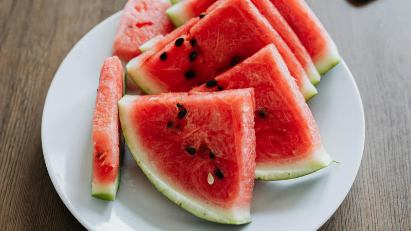 20. Watermelon Helps With Hydration 1. Sweet Potatoes Reduce Inflammation, 2. Sunflower Seeds Support Collagen Production, 3. Red Grapes Defend Against UV Damage, 4. Bell Peppers Brighten Complexion, 5. Green Tea Reduces Acne Flare-Ups, 6. Avocados Improve Skin Elasticity, 7. Walnuts Provide Essential Skin Nutrients, 8. Tomatoes Shield Skin From The Sun, 9. Fatty Fish Fight Skin Aging, 10. Broccoli Boosts Skin Immunity, 11. Oranges Enhance Skin Radiance, 12. Carrots Help Prevent Acne, 13. Turmeric Clears Skin Inflammation, 14. Kiwi Repairs Damaged Skin, 15. Blueberries Protect Against Premature Aging, 16. Dark Chocolate Hydrates Skin, 17. Mushrooms Improve Skin Tone, 18. Cucumber Soothes Irritated Skin, 19. Almonds Protect Against UV Damage, 20. Watermelon Helps With Hydration
