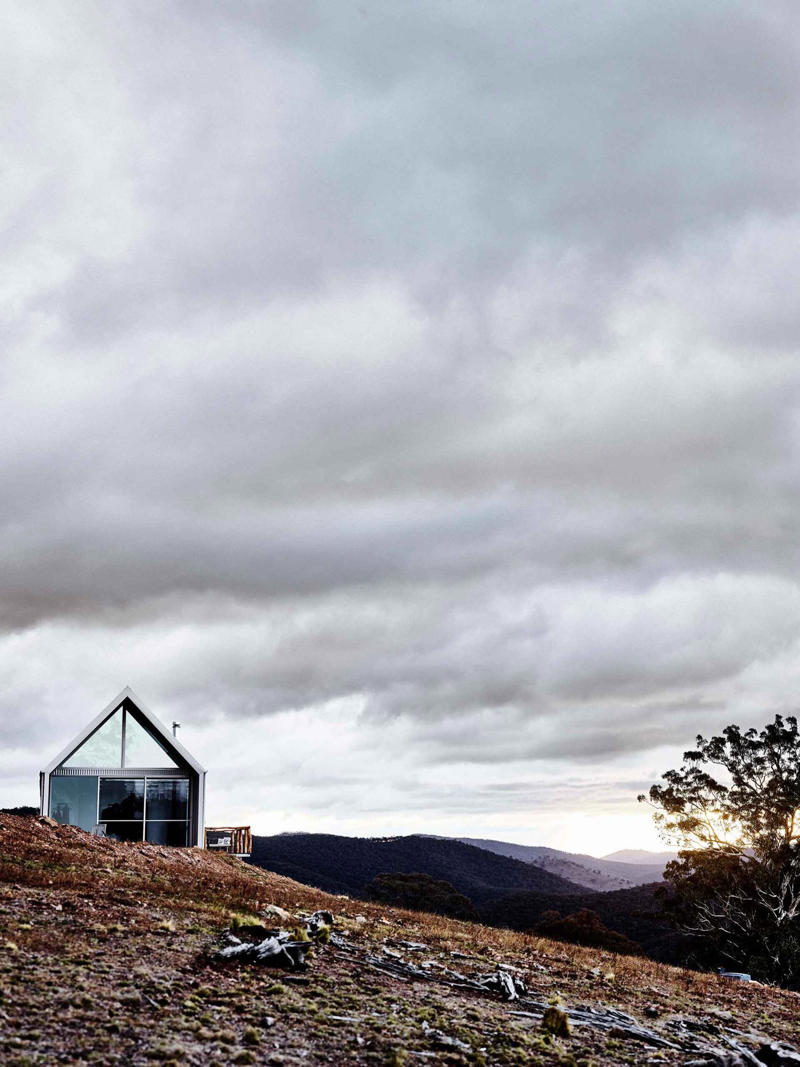 What are some of the key design elements of barn houses?, 23 modern barn-style houses with design ideas to inspire, A barn house with waterfront views , The Little Red Barn , Port Farm , A shed conversion in the Scenic Rim , Black & Bright alpine stay , An 1880s red farmhouse , An eco-friendly family home , The Barn at Rangeview , The classic barn-style house , The Highlands Black Barn , A barn-style new build , Two barns on a biodynamic farm , A barn conversion , The Sir George , Monochromatic barn house , A barn-style home in the Wolgan Valley , A European-inspired brick barn , Modern barn home , Barn-style beach house , A cosy country farmhouse , A country retreat with alpine style , An interior designer’s highlands weekender , A Queensland pool house , What is the difference between a barndo and a barn-style house?, What is the difference between a barn house and a farmhouse?, Are barn-style houses cheap to build?