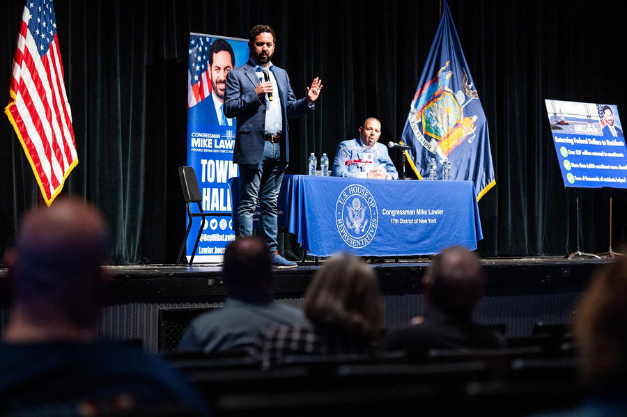 Rep. Escobar at peaceful protest for unity, Border Patrol Agent discusses migrant dangers, Migrants undergo security checks after border crossing, Rep. Escobar at Sun City Pride Parade, Immigration officer escorts migrants in El Paso, Mike Lawler at playground opening ceremony, Rep. Lawler speaks at town hall meeting, Rep. Lawler at press conference on TPS extension