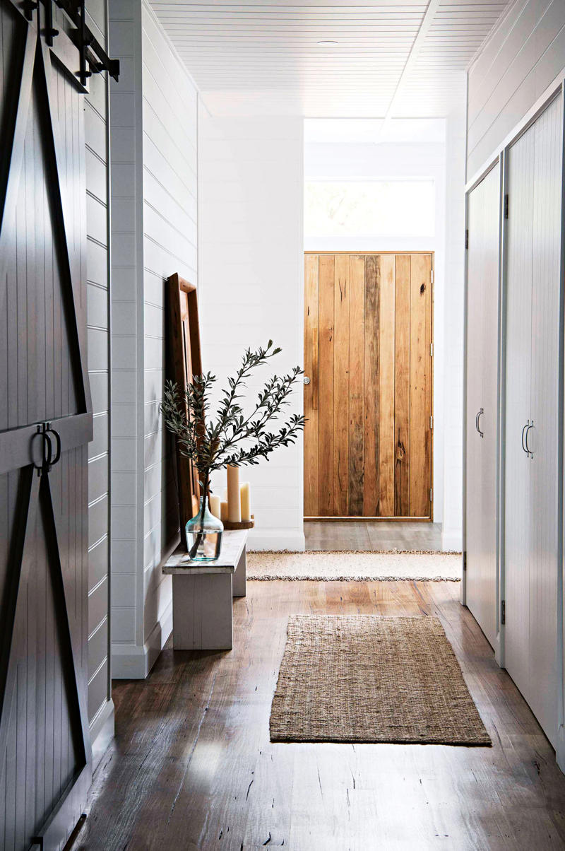 What are some of the key design elements of barn houses?, 23 modern barn-style houses with design ideas to inspire, A barn house with waterfront views , The Little Red Barn , Port Farm , A shed conversion in the Scenic Rim , Black & Bright alpine stay , An 1880s red farmhouse , An eco-friendly family home , The Barn at Rangeview , The classic barn-style house , The Highlands Black Barn , A barn-style new build , Two barns on a biodynamic farm , A barn conversion , The Sir George , Monochromatic barn house , A barn-style home in the Wolgan Valley , A European-inspired brick barn , Modern barn home , Barn-style beach house , A cosy country farmhouse , A country retreat with alpine style , An interior designer’s highlands weekender , A Queensland pool house , What is the difference between a barndo and a barn-style house?, What is the difference between a barn house and a farmhouse?, Are barn-style houses cheap to build?