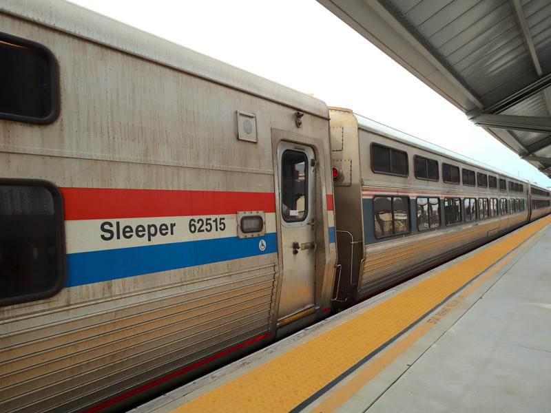 Unfortunately, my first-class journey began with a five-hour delay., Once my train finally arrived, I got to board early., A dedicated attendant guided me down the slim walkways to my room., The upper level featured a comfortable bed., The upper bed had its own storage space and viewing window., The dining car felt like a fine-dining experience ..., After a long day, the bed in the roomette was a godsend., Finally, I arrived at my destination six hours after the scheduled time.