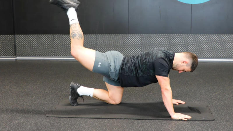 1. Push-Ups, 2. Squats, 3. Planks, 4. Lunges, 5. Glute Bridges, 6. Wall Sits, 7. Triceps Dips, 8. Mountain Climbers, 9. Burpees, 10. High Knees, 11. Superman Hold, 12. Hollow Body Hold, 13. Wall Angels, 14. Bear Crawls, 15. Step-Ups, 16. Crab Walks, 17. Wall Walks, 18. Skater Hops, 19. Donkey Kicks, 20. Inchworms