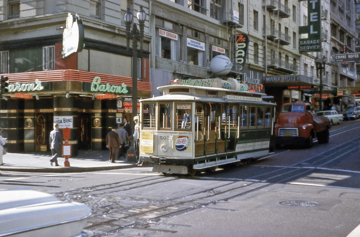 14. A wonderful snapshot of the San Francisco street scene, 1958 1. Fans watching the new 1958 Los Angeles Dodgers, 2. A 1958 Chevrolet Imapala, 3. A solid Saturday afternoon matinee by the looks of it, circa 1958, 4. A couple young ladies waiting around in the benches, dressed their best, 1958, 5. Someone's family on a road trip, Kodachrome, 1958, 6. Scotch & Pretzels, 1958, 7. A proud owner of a new 1958 Oldsmobile, 8. A diner somewhere in America, 1958, 9. The Miami International Airport, 1958, 10. The front seat of a 1958 Buick, 11. Party at grandma's house, 1958, 12. Sellers of bread, Athens, Greece, 1958, 13. 1958, Oswego, New York, 14. A wonderful snapshot of the San Francisco street scene, 1958, 15. Pele, Sweden, 1958, 16. Canal Street, New Orleans, Louisiana, 1958, 17. Knott's Berry Farm, late 1950s, 18. A quick stop for breakfast for a long ole drive around, late 1950s, 19. Niagara Falls, 1958, 20. Dearborn, Michigan, Fire Department, 21. Kids playing ball in the street, 1958, 22. Christmastime in downtown Marion, Indiana, 1958, 23. A rainy day in Downtown, Indianapolis, Indiana, 24. Rochester, New York, 1958, 25. The Brussels International Airport, 1958, 26. People at the popular holiday resort of Capri, Italy, 1958, 27. A frosty day in February, 1958, 28. Listening to music in art class back in 1957, 29. Open-air schools in Netherlands in 1957, 30. Bill showing off his model aircraft collection in the late 1950s, 31. A high school football game in 1957, 32. Hanging out with a new car in a new subdivision, late 1950s, 33. A couple kids dreaming after grabbing a couple new toys in the late 1950s, 34. Getting dropped for naval flight training in 1957