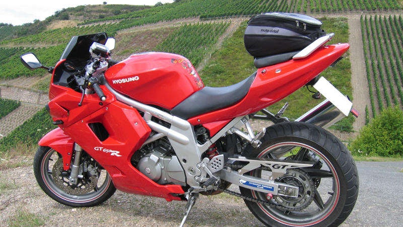 4. 2005 Hyosung GT650R 1. 1991 Harley‑Davidson Sportster 883, 2. 1997 Bimota V‑Due, 3. 2014 Honda CTX1300, 4. 2005 Hyosung GT650R, 5. Piatti Scooter, 6. 2017 Harley‑Davidson Street Rod, 7. Suzuki RE5 (1974–1976), 8. BMW K1 (1988–1993), 9. Honda Big Ruckus/PS250 (2004–2007), 10. Royal Enfield Himalayan (2016– ), 1. Kawasaki Vulcan 1700 Voyager ABS, 2. Kawasaki Versys 1000 SE LT+, 3. Honda Gold Wing Tour, 4. Honda Gold Wing (Base Model), 5. Kawasaki Concours 14, 6. Suzuki V‑Strom 650, 7. Kawasaki Versys 650 LT ABS, 8. BMW R1250 RT, 9. BMW F750 GS, 10. Honda CBR650R