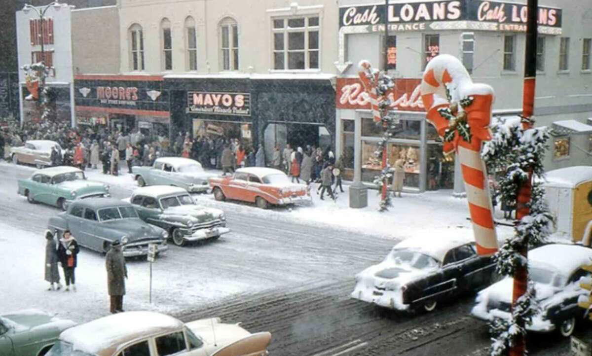 22. Christmastime in downtown Marion, Indiana, 1958 1. Fans watching the new 1958 Los Angeles Dodgers, 2. A 1958 Chevrolet Imapala, 3. A solid Saturday afternoon matinee by the looks of it, circa 1958, 4. A couple young ladies waiting around in the benches, dressed their best, 1958, 5. Someone's family on a road trip, Kodachrome, 1958, 6. Scotch & Pretzels, 1958, 7. A proud owner of a new 1958 Oldsmobile, 8. A diner somewhere in America, 1958, 9. The Miami International Airport, 1958, 10. The front seat of a 1958 Buick, 11. Party at grandma's house, 1958, 12. Sellers of bread, Athens, Greece, 1958, 13. 1958, Oswego, New York, 14. A wonderful snapshot of the San Francisco street scene, 1958, 15. Pele, Sweden, 1958, 16. Canal Street, New Orleans, Louisiana, 1958, 17. Knott's Berry Farm, late 1950s, 18. A quick stop for breakfast for a long ole drive around, late 1950s, 19. Niagara Falls, 1958, 20. Dearborn, Michigan, Fire Department, 21. Kids playing ball in the street, 1958, 22. Christmastime in downtown Marion, Indiana, 1958, 23. A rainy day in Downtown, Indianapolis, Indiana, 24. Rochester, New York, 1958, 25. The Brussels International Airport, 1958, 26. People at the popular holiday resort of Capri, Italy, 1958, 27. A frosty day in February, 1958, 28. Listening to music in art class back in 1957, 29. Open-air schools in Netherlands in 1957, 30. Bill showing off his model aircraft collection in the late 1950s, 31. A high school football game in 1957, 32. Hanging out with a new car in a new subdivision, late 1950s, 33. A couple kids dreaming after grabbing a couple new toys in the late 1950s, 34. Getting dropped for naval flight training in 1957