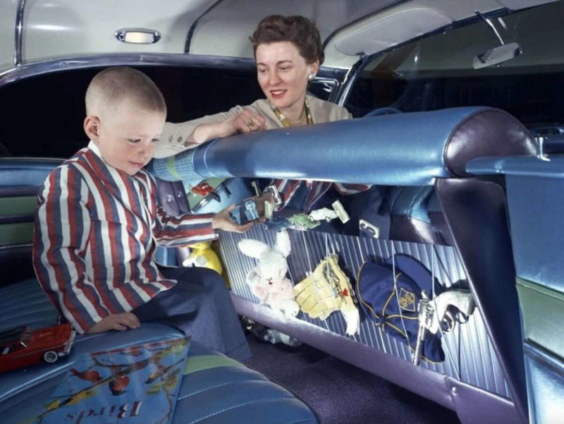 10. The front seat of a 1958 Buick 1. Fans watching the new 1958 Los Angeles Dodgers, 2. A 1958 Chevrolet Imapala, 3. A solid Saturday afternoon matinee by the looks of it, circa 1958, 4. A couple young ladies waiting around in the benches, dressed their best, 1958, 5. Someone's family on a road trip, Kodachrome, 1958, 6. Scotch & Pretzels, 1958, 7. A proud owner of a new 1958 Oldsmobile, 8. A diner somewhere in America, 1958, 9. The Miami International Airport, 1958, 10. The front seat of a 1958 Buick, 11. Party at grandma's house, 1958, 12. Sellers of bread, Athens, Greece, 1958, 13. 1958, Oswego, New York, 14. A wonderful snapshot of the San Francisco street scene, 1958, 15. Pele, Sweden, 1958, 16. Canal Street, New Orleans, Louisiana, 1958, 17. Knott's Berry Farm, late 1950s, 18. A quick stop for breakfast for a long ole drive around, late 1950s, 19. Niagara Falls, 1958, 20. Dearborn, Michigan, Fire Department, 21. Kids playing ball in the street, 1958, 22. Christmastime in downtown Marion, Indiana, 1958, 23. A rainy day in Downtown, Indianapolis, Indiana, 24. Rochester, New York, 1958, 25. The Brussels International Airport, 1958, 26. People at the popular holiday resort of Capri, Italy, 1958, 27. A frosty day in February, 1958, 28. Listening to music in art class back in 1957, 29. Open-air schools in Netherlands in 1957, 30. Bill showing off his model aircraft collection in the late 1950s, 31. A high school football game in 1957, 32. Hanging out with a new car in a new subdivision, late 1950s, 33. A couple kids dreaming after grabbing a couple new toys in the late 1950s, 34. Getting dropped for naval flight training in 1957