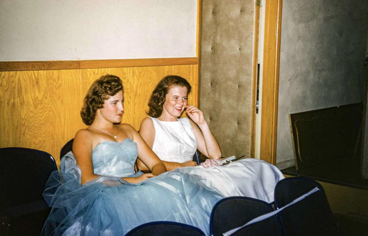 4. A couple young ladies waiting around in the benches, dressed their best, 1958 1. Fans watching the new 1958 Los Angeles Dodgers, 2. A 1958 Chevrolet Imapala, 3. A solid Saturday afternoon matinee by the looks of it, circa 1958, 4. A couple young ladies waiting around in the benches, dressed their best, 1958, 5. Someone's family on a road trip, Kodachrome, 1958, 6. Scotch & Pretzels, 1958, 7. A proud owner of a new 1958 Oldsmobile, 8. A diner somewhere in America, 1958, 9. The Miami International Airport, 1958, 10. The front seat of a 1958 Buick, 11. Party at grandma's house, 1958, 12. Sellers of bread, Athens, Greece, 1958, 13. 1958, Oswego, New York, 14. A wonderful snapshot of the San Francisco street scene, 1958, 15. Pele, Sweden, 1958, 16. Canal Street, New Orleans, Louisiana, 1958, 17. Knott's Berry Farm, late 1950s, 18. A quick stop for breakfast for a long ole drive around, late 1950s, 19. Niagara Falls, 1958, 20. Dearborn, Michigan, Fire Department, 21. Kids playing ball in the street, 1958, 22. Christmastime in downtown Marion, Indiana, 1958, 23. A rainy day in Downtown, Indianapolis, Indiana, 24. Rochester, New York, 1958, 25. The Brussels International Airport, 1958, 26. People at the popular holiday resort of Capri, Italy, 1958, 27. A frosty day in February, 1958, 28. Listening to music in art class back in 1957, 29. Open-air schools in Netherlands in 1957, 30. Bill showing off his model aircraft collection in the late 1950s, 31. A high school football game in 1957, 32. Hanging out with a new car in a new subdivision, late 1950s, 33. A couple kids dreaming after grabbing a couple new toys in the late 1950s, 34. Getting dropped for naval flight training in 1957