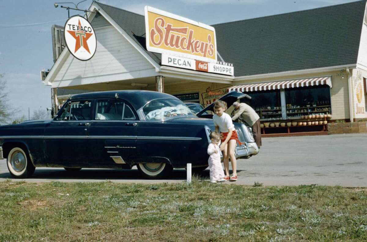 5. Someone's family on a road trip, Kodachrome, 1958 1. Fans watching the new 1958 Los Angeles Dodgers, 2. A 1958 Chevrolet Imapala, 3. A solid Saturday afternoon matinee by the looks of it, circa 1958, 4. A couple young ladies waiting around in the benches, dressed their best, 1958, 5. Someone's family on a road trip, Kodachrome, 1958, 6. Scotch & Pretzels, 1958, 7. A proud owner of a new 1958 Oldsmobile, 8. A diner somewhere in America, 1958, 9. The Miami International Airport, 1958, 10. The front seat of a 1958 Buick, 11. Party at grandma's house, 1958, 12. Sellers of bread, Athens, Greece, 1958, 13. 1958, Oswego, New York, 14. A wonderful snapshot of the San Francisco street scene, 1958, 15. Pele, Sweden, 1958, 16. Canal Street, New Orleans, Louisiana, 1958, 17. Knott's Berry Farm, late 1950s, 18. A quick stop for breakfast for a long ole drive around, late 1950s, 19. Niagara Falls, 1958, 20. Dearborn, Michigan, Fire Department, 21. Kids playing ball in the street, 1958, 22. Christmastime in downtown Marion, Indiana, 1958, 23. A rainy day in Downtown, Indianapolis, Indiana, 24. Rochester, New York, 1958, 25. The Brussels International Airport, 1958, 26. People at the popular holiday resort of Capri, Italy, 1958, 27. A frosty day in February, 1958, 28. Listening to music in art class back in 1957, 29. Open-air schools in Netherlands in 1957, 30. Bill showing off his model aircraft collection in the late 1950s, 31. A high school football game in 1957, 32. Hanging out with a new car in a new subdivision, late 1950s, 33. A couple kids dreaming after grabbing a couple new toys in the late 1950s, 34. Getting dropped for naval flight training in 1957