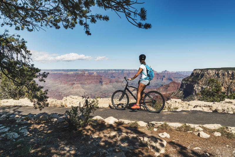 1. Ride the train to the South Rim via Grand Canyon Railway, 2. Absorb the canyon’s majesty from several viewpoints, 3. Admire landscape-inspired art at Kolb Studio, 4. Take a hike along Bright Angel Trail or South Kaibab Trail, 5. Check into Phantom Ranch or another woodsy in-park lodge, 6. Kayak curvy Horseshoe Bend, 7. Go white-water rafting on the Colorado River, 8. Take in layered vistas with a bike ride along the South Rim Trail, 9. Don’t forget a North Rim excursion, 10. Explore the East Entrance and Desert View Watchtower, 11. Admire the view from Roosevelt Point, 12. Embark on a mule trip to the bottom of the canyon, 13. Visit the Trail of Time for a geologic journey, 14. Tour the East Cabin at Pipe Spring National Monument, 15. Marvel at the night sky, 16. Step back in time at Bright Angel Lodge, 17. Walk the edge of the Skywalk, 18. Soar high on a scenic helicopter tour