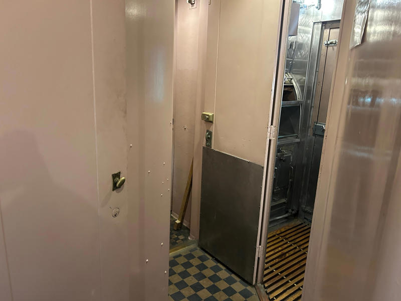 Passengers boarded from the front of the train, which housed the staff quarters and kitchen. To carry the president, the unique armored car had enhanced security features., In the kitchen, an onboard chef had access to ovens and refrigerators., The car housed two staff members: a chef and a porter., The car included two guest bedrooms along with a presidential suite., The presidential suite included the president's sleeping area., The first lady's room was located parallel to the president's., A narrow hallway led from the staterooms to the observation deck., The observation lounge featured some of the presidential car's original furniture., During the refurbishment, a submarine escape hatch was added to the car.