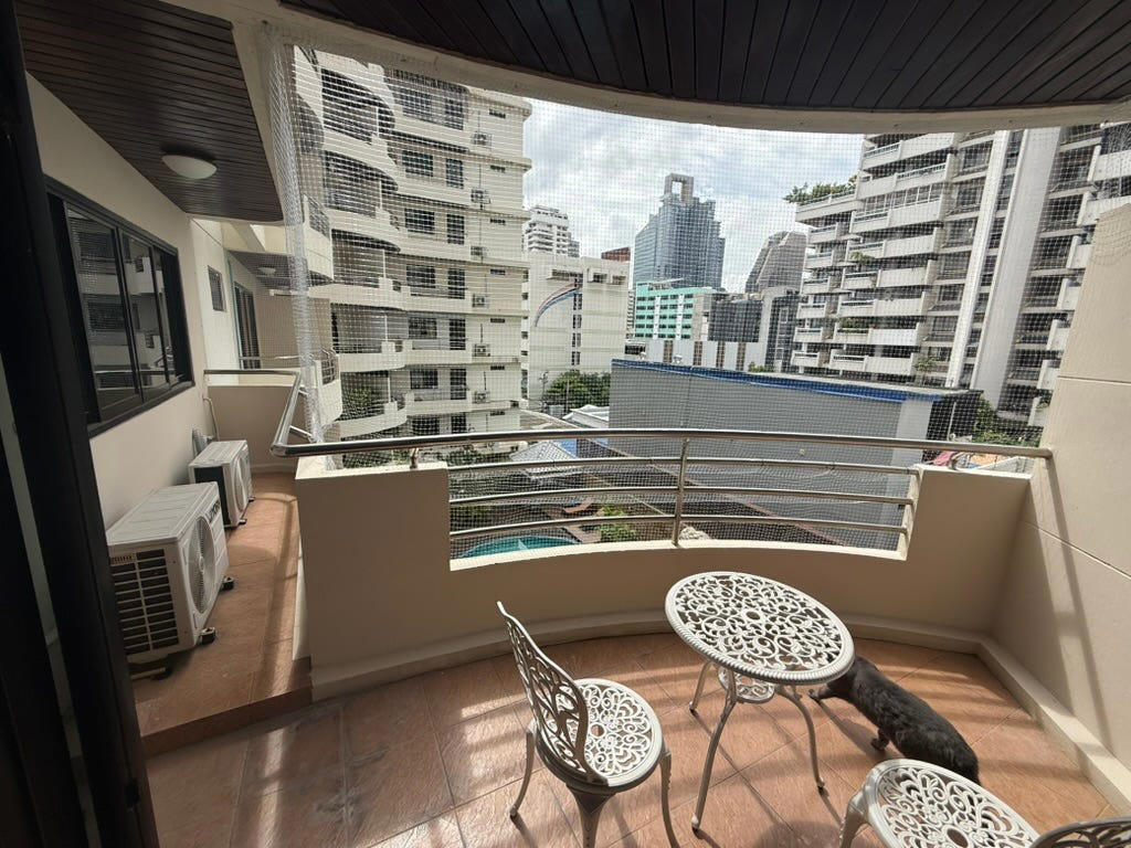 The apartment is just under 3,000 square feet with a comfortable living room and a balcony overlooking the pool.