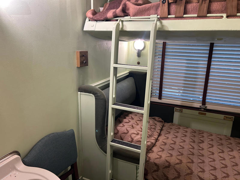 The car included two guest bedrooms along with a presidential suite. To carry the president, the unique armored car had enhanced security features., In the kitchen, an onboard chef had access to ovens and refrigerators., The car housed two staff members: a chef and a porter., The car included two guest bedrooms along with a presidential suite., The presidential suite included the president's sleeping area., The first lady's room was located parallel to the president's., A narrow hallway led from the staterooms to the observation deck., The observation lounge featured some of the presidential car's original furniture., During the refurbishment, a submarine escape hatch was added to the car.