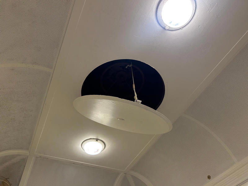 During the refurbishment, a submarine escape hatch was added to the car. To carry the president, the unique armored car had enhanced security features., In the kitchen, an onboard chef had access to ovens and refrigerators., The car housed two staff members: a chef and a porter., The car included two guest bedrooms along with a presidential suite., The presidential suite included the president's sleeping area., The first lady's room was located parallel to the president's., A narrow hallway led from the staterooms to the observation deck., The observation lounge featured some of the presidential car's original furniture., During the refurbishment, a submarine escape hatch was added to the car.