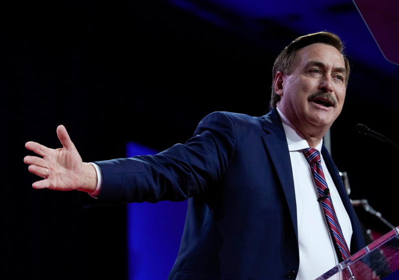 Mike Lindell at CPAC 2023 conference Mike Lindell at CPAC 2024 in National Harbor, Mike Lindell at CPAC 2023 conference, Mike Lindell speaks at Trump rally in Mesa, Mike Lindell poses with fan at Trump rally, Denise Hunt prays for Mike Lindell at rally, Mike Lindell at Trump’s gala in Palm Beach, Linda Rantz and Andy Palecek discuss election security, Mike Lindell greets Trump supporters in Palm Beach