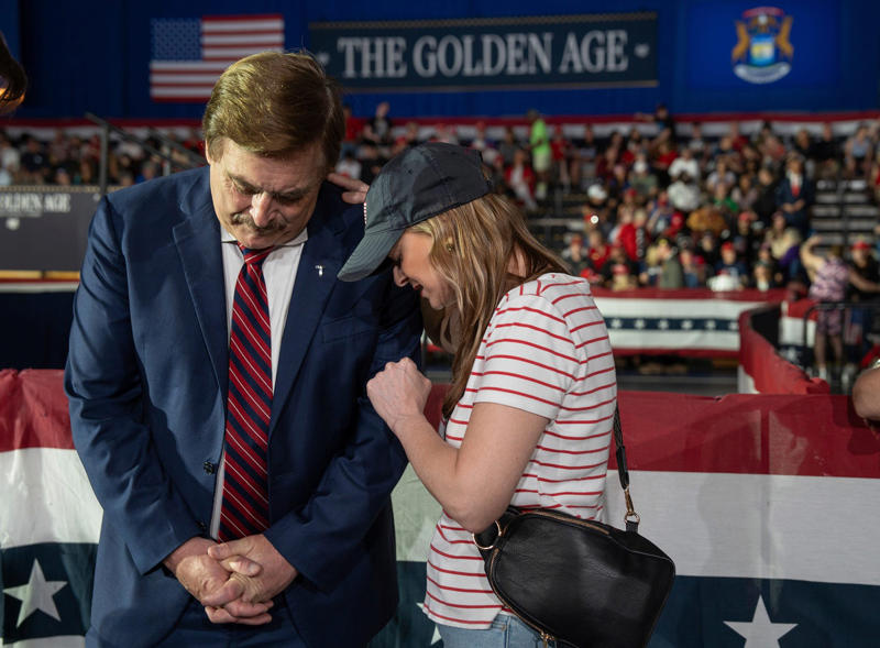 Denise Hunt prays for Mike Lindell at rally Mike Lindell at CPAC 2024 in National Harbor, Mike Lindell at CPAC 2023 conference, Mike Lindell speaks at Trump rally in Mesa, Mike Lindell poses with fan at Trump rally, Denise Hunt prays for Mike Lindell at rally, Mike Lindell at Trump’s gala in Palm Beach, Linda Rantz and Andy Palecek discuss election security, Mike Lindell greets Trump supporters in Palm Beach