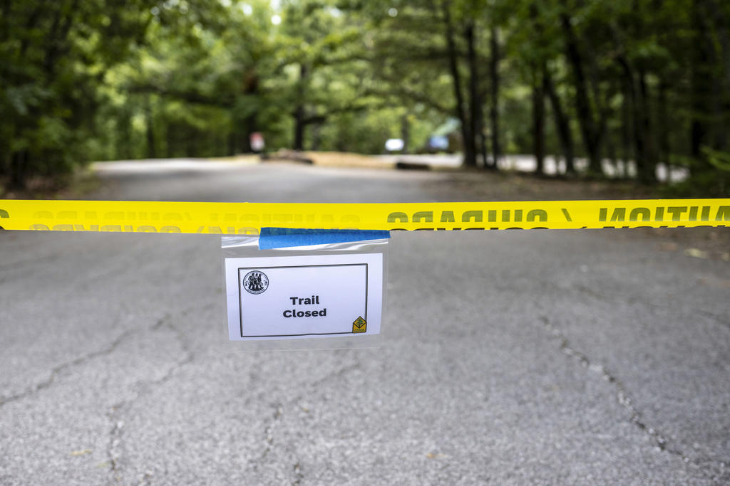 Family new to Arkansas, Suspect is a newly hired teacher, Tips from the public, A park known for trails and rock formations