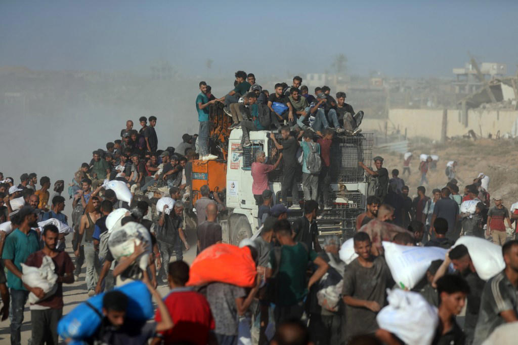 ‘More than 48 Palestinians killed’ waiting for flour delivery in Gaza Strip