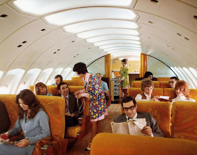Groove was in the skies. Welcome to the golden age of flying!, The sky and cocktail lounge era., Not just a plane, it was a flying party lounge., This Japan Airlines cabin looked like a flying art gallery., Seems like flying was basically a deli dream., Groove was in the skies., Cocktail hour in the clouds was a must., Airline lounges? More like a Bond movie set., When the in-flight meal came with real plates., Sipping and playing cards. Pure bliss., Back when everyone had lounge access., No baggage fees, just smiles and drinks., Conversation pods for a cruising altitude., Studio 54 with some light turbulence., First class or a retro nightclub?, Beef Wellington at 30,000 feet., No turbulence, just a toast in the aisle., Fresh fruit? Yes, please.