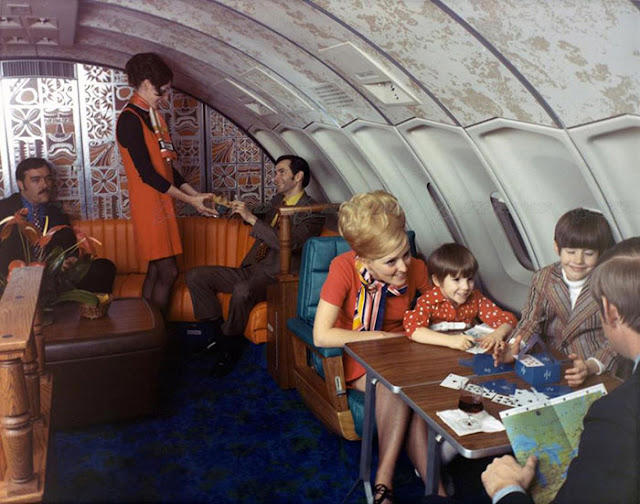 Sipping and playing cards. Pure bliss. Welcome to the golden age of flying!, The sky and cocktail lounge era., Not just a plane, it was a flying party lounge., This Japan Airlines cabin looked like a flying art gallery., Seems like flying was basically a deli dream., Groove was in the skies., Cocktail hour in the clouds was a must., Airline lounges? More like a Bond movie set., When the in-flight meal came with real plates., Sipping and playing cards. Pure bliss., Back when everyone had lounge access., No baggage fees, just smiles and drinks., Conversation pods for a cruising altitude., Studio 54 with some light turbulence., First class or a retro nightclub?, Beef Wellington at 30,000 feet., No turbulence, just a toast in the aisle., Fresh fruit? Yes, please.