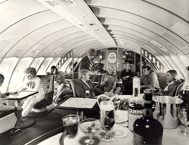 Studio 54 with some light turbulence. Welcome to the golden age of flying!, The sky and cocktail lounge era., Not just a plane, it was a flying party lounge., This Japan Airlines cabin looked like a flying art gallery., Seems like flying was basically a deli dream., Groove was in the skies., Cocktail hour in the clouds was a must., Airline lounges? More like a Bond movie set., When the in-flight meal came with real plates., Sipping and playing cards. Pure bliss., Back when everyone had lounge access., No baggage fees, just smiles and drinks., Conversation pods for a cruising altitude., Studio 54 with some light turbulence., First class or a retro nightclub?, Beef Wellington at 30,000 feet., No turbulence, just a toast in the aisle., Fresh fruit? Yes, please.